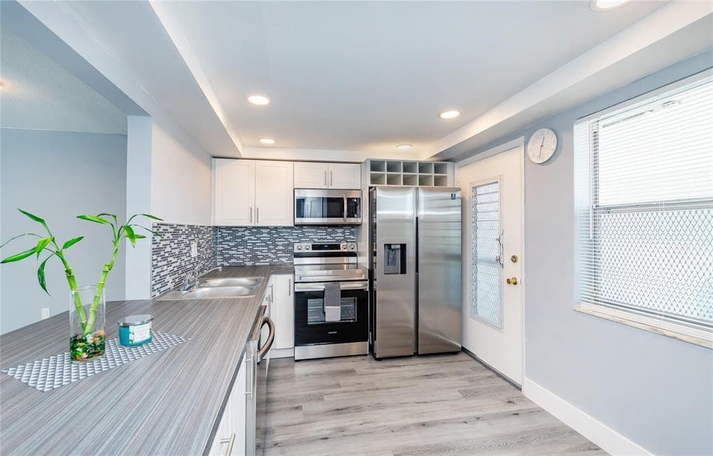 Condominium at 1101 NE 191ST Street # H301, Miami FL 33179