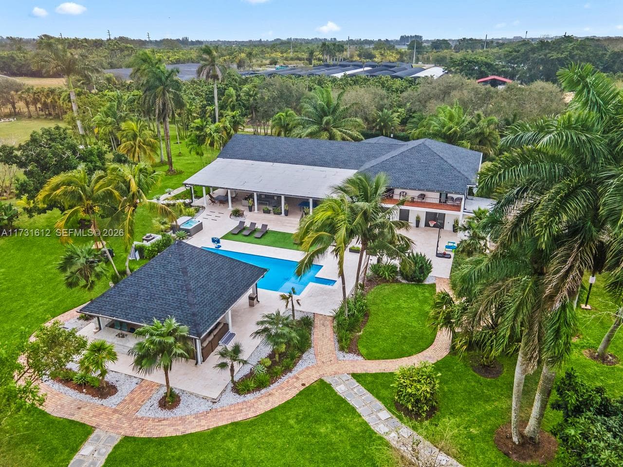 Single Family Residence at 14875 SW 212th St, Miami FL 33187