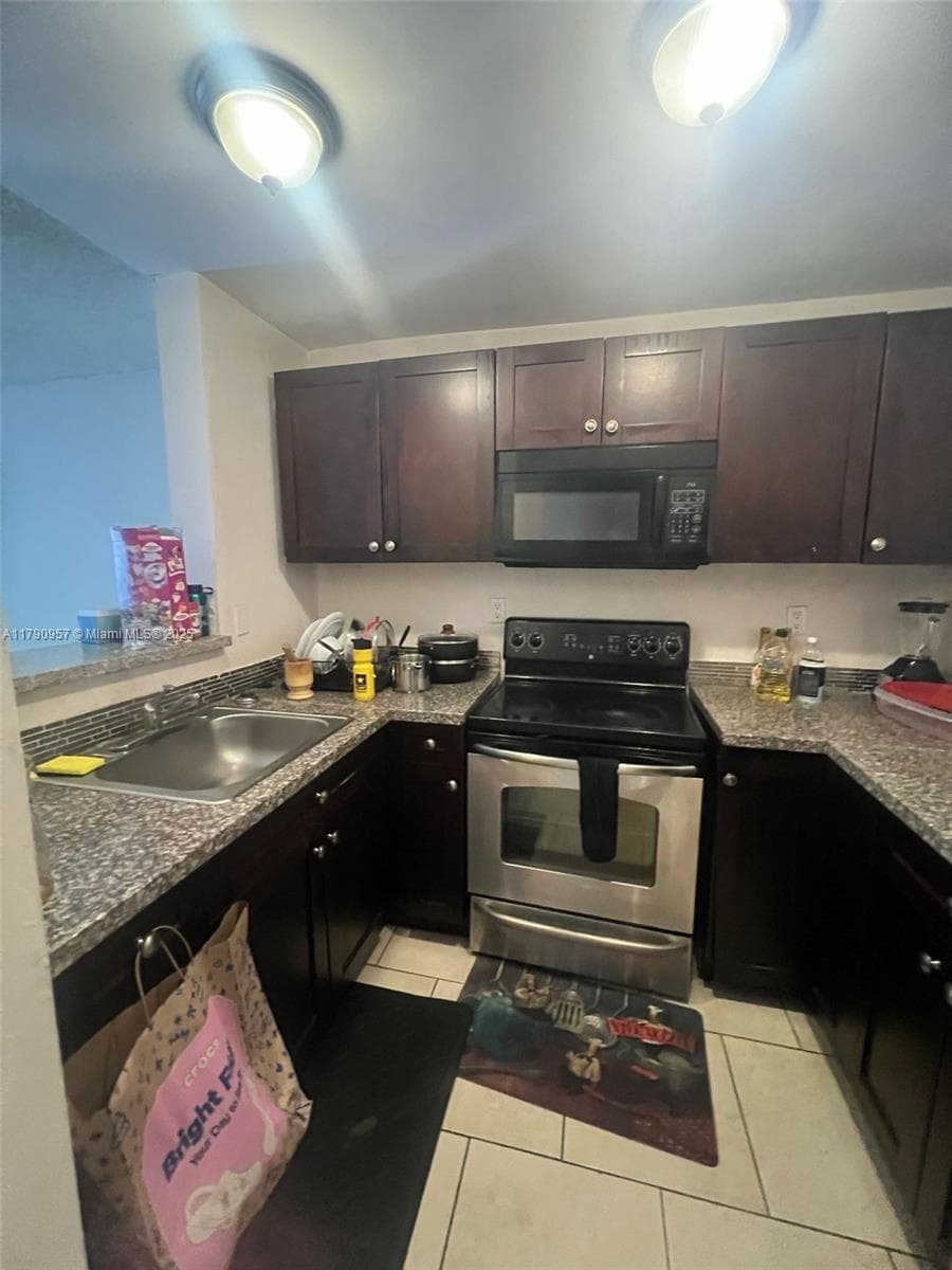 Condominium at 482 NW 165th St Rd # A203, Miami FL 33169