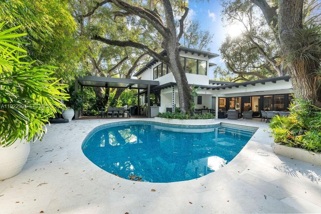 Single Family Residence at 4095 Battersea Rd, Miami FL 33133