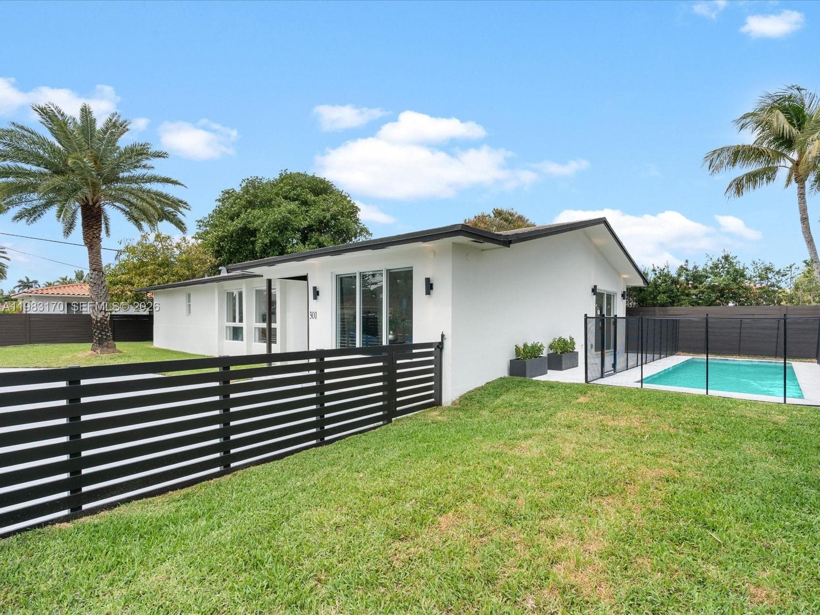 Single Family Residence at 301 88th St, Surfside FL 33154