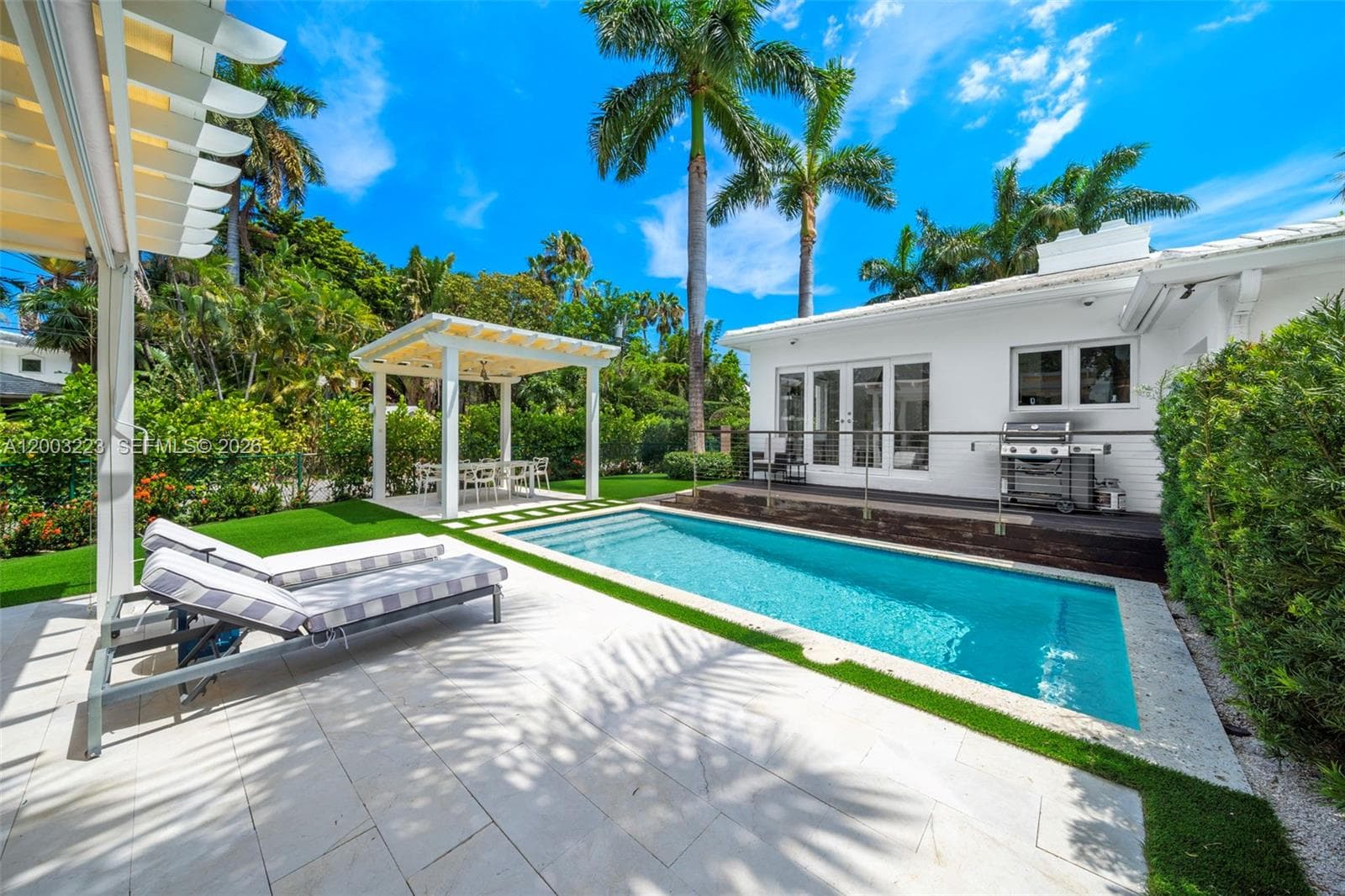 Single Family Residence at 330 E San Marino Dr, Miami Beach FL 33139