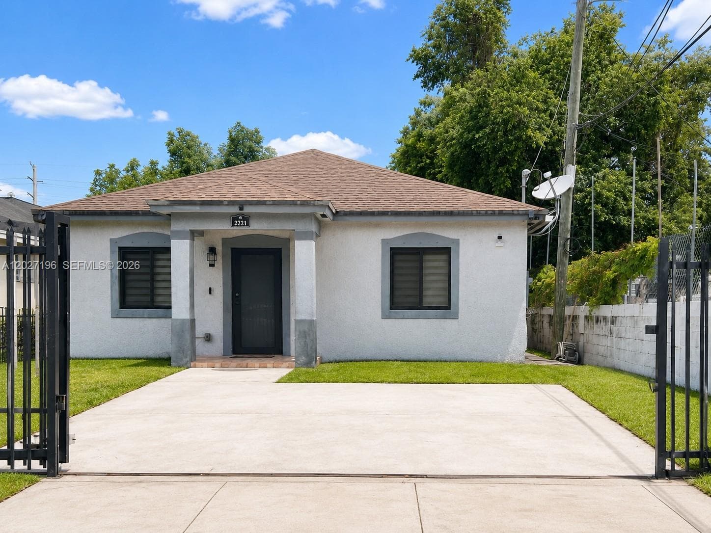Single Family Residence at 2221 NW 57th St, Miami FL 33142