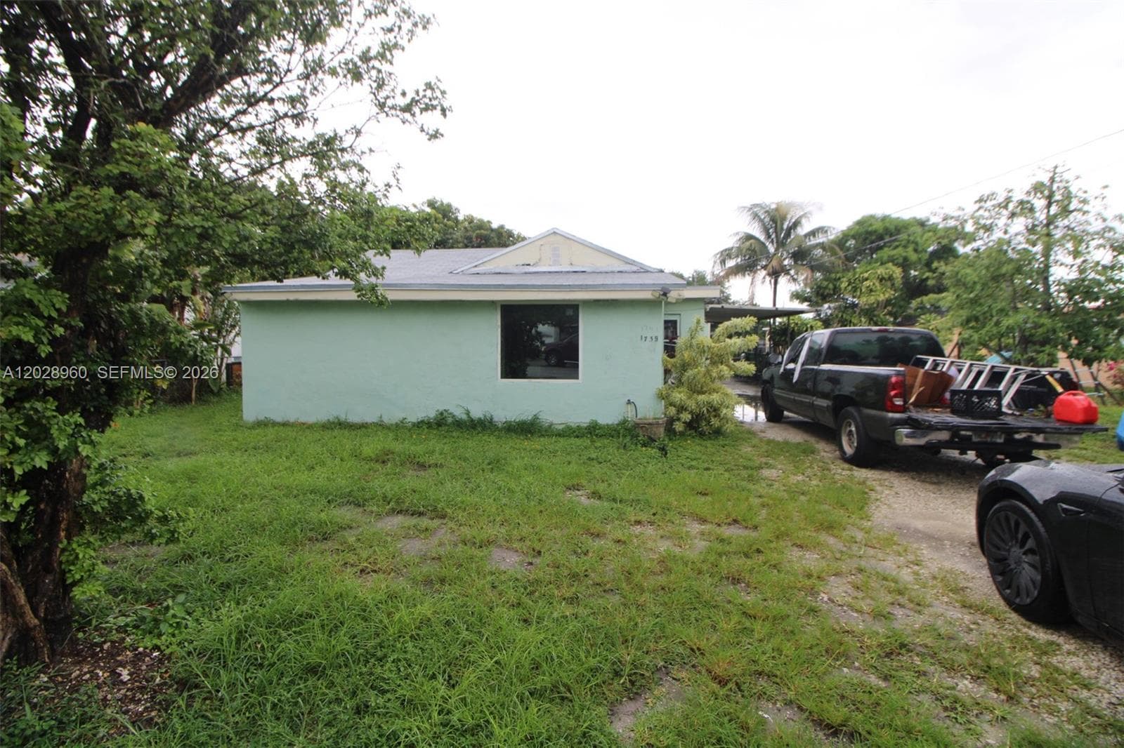 Single Family Residence at 1741 NW 92nd St, Miami FL 33147