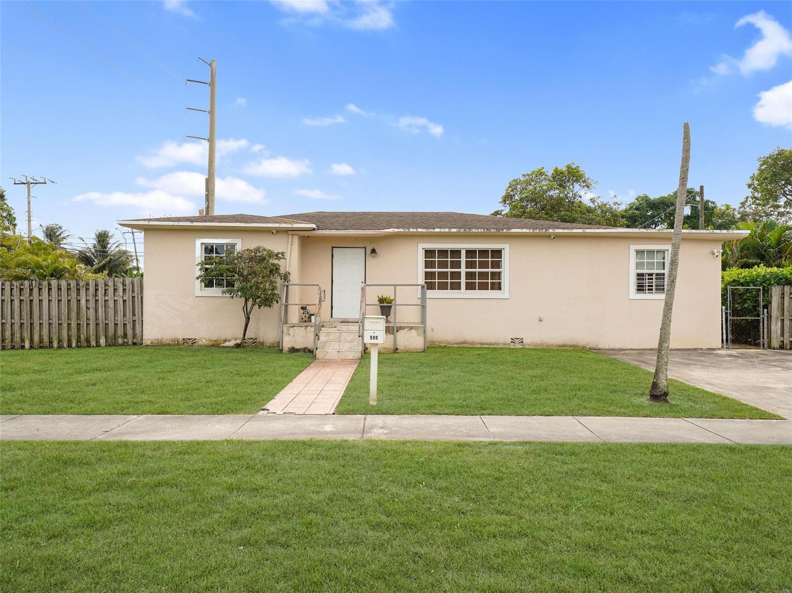 Single Family Residence at 500 NW 120th Street, Miami FL 33168