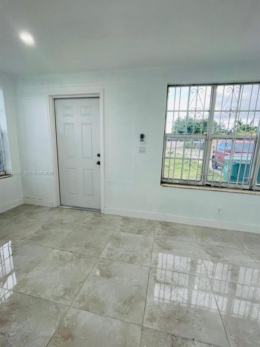 Single Family Residence at 2437 NW 98th St, Miami FL 33147