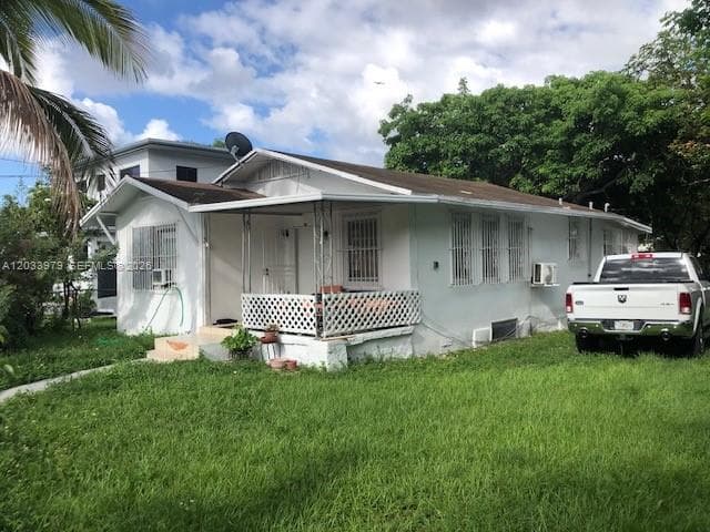 Single Family Residence at 3314 NW 9th Ct, Miami FL 33127