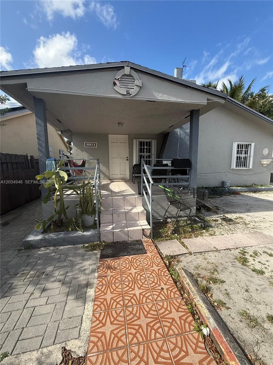 Single Family Residence at 1143 NW 27th St, Miami FL 33127