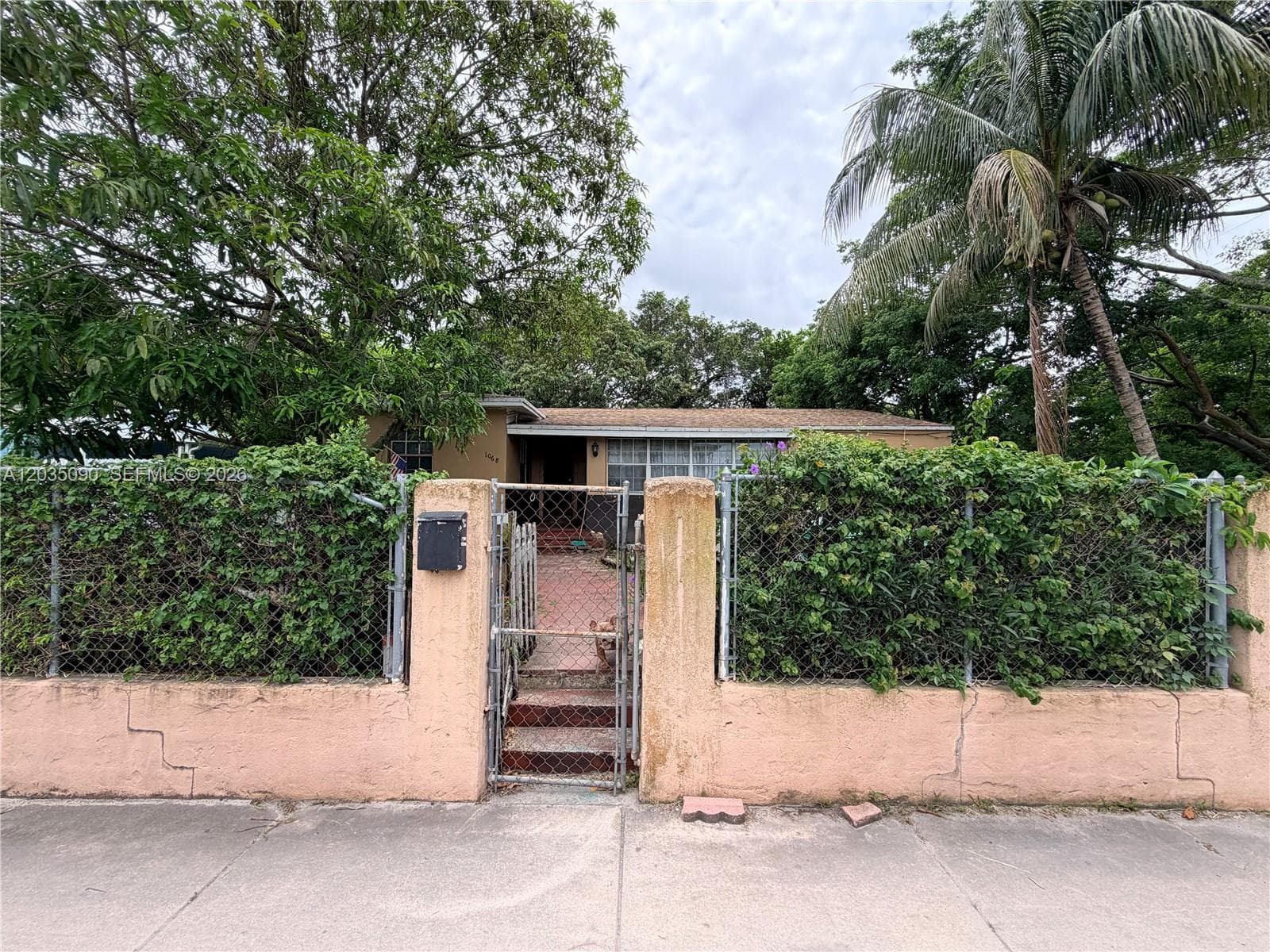 Single Family Residence at 1068 NW 34th St, Miami FL 33127