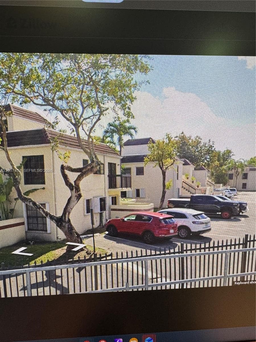 Condominium at 12910 SW 88th Ter # 203, Miami FL 33186