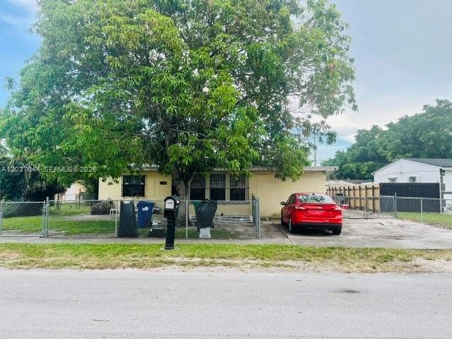 Single Family Residence at 3100 NW 162nd St, Miami Gardens FL 33054