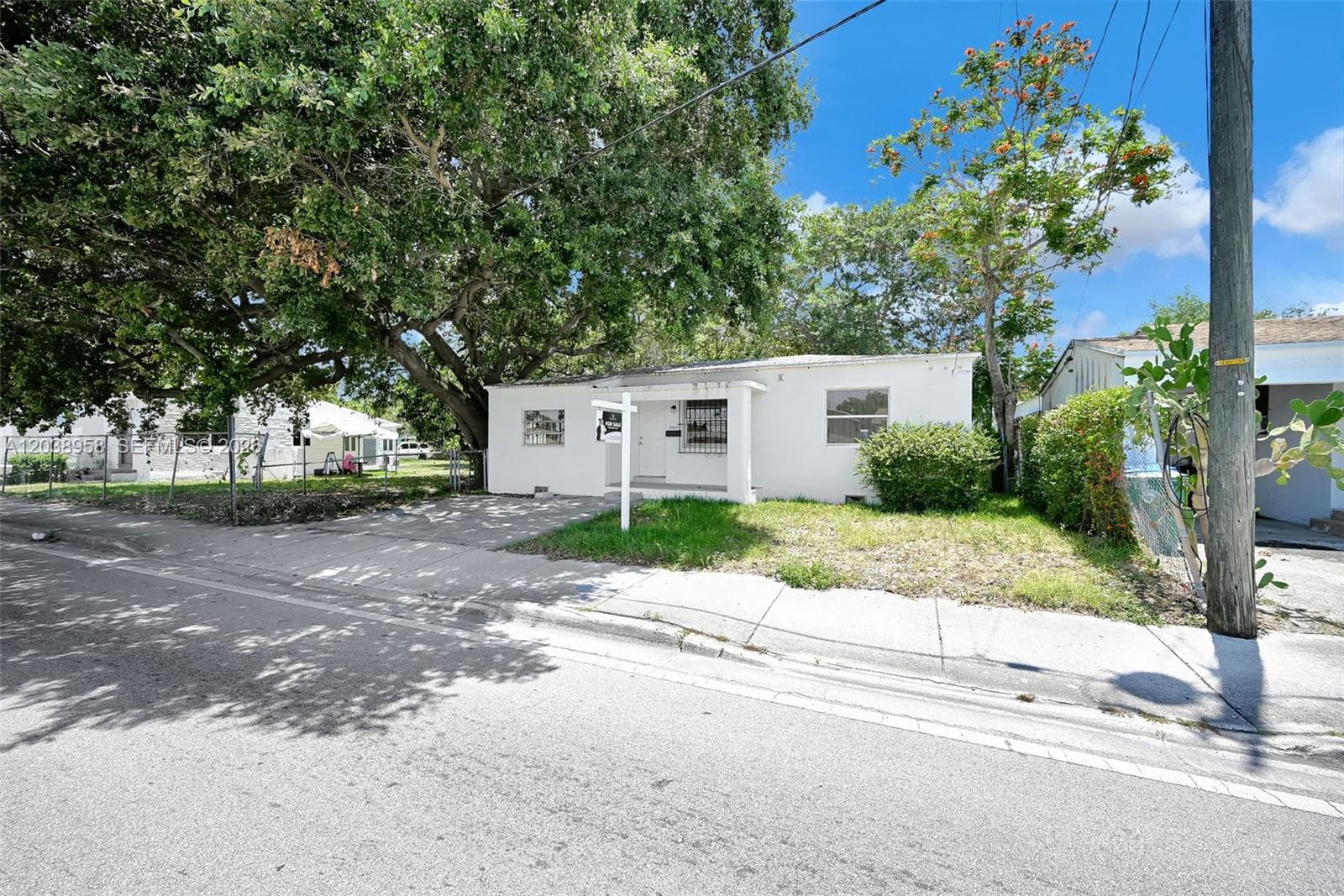 Single Family Residence at 5511 NW 12th Ave, Miami FL 33127