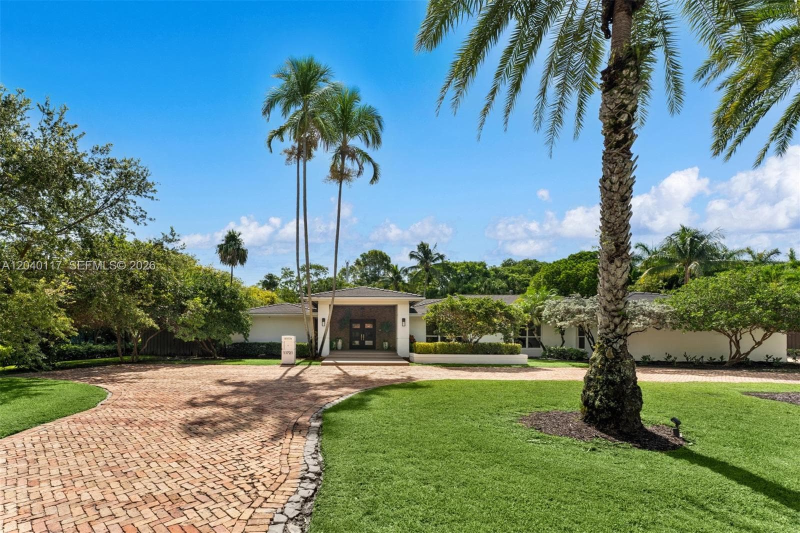 Single Family Residence at 11721 Jacaranda Pl, Coral Gables FL 33156
