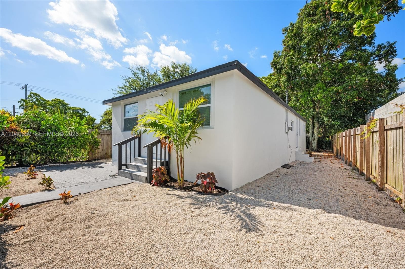 Single Family Residence at 1820 NW 63rd St, Miami FL 33147