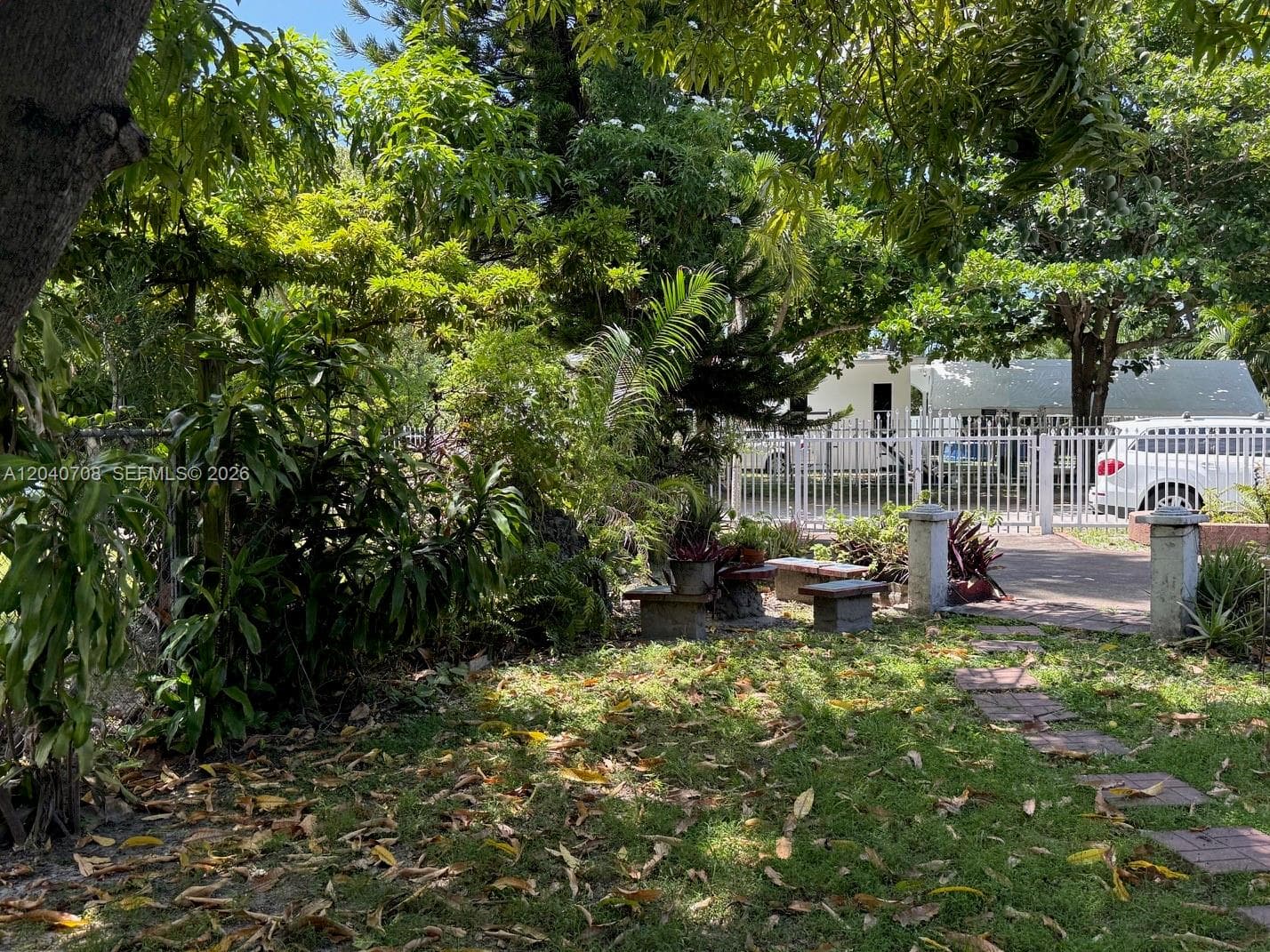 Single Family Residence at 12600 Country Club Ln, Miami FL 33167