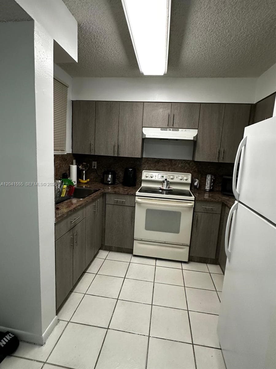 Condominium at 14931 SW 82nd Ln # 506, Miami FL 33193