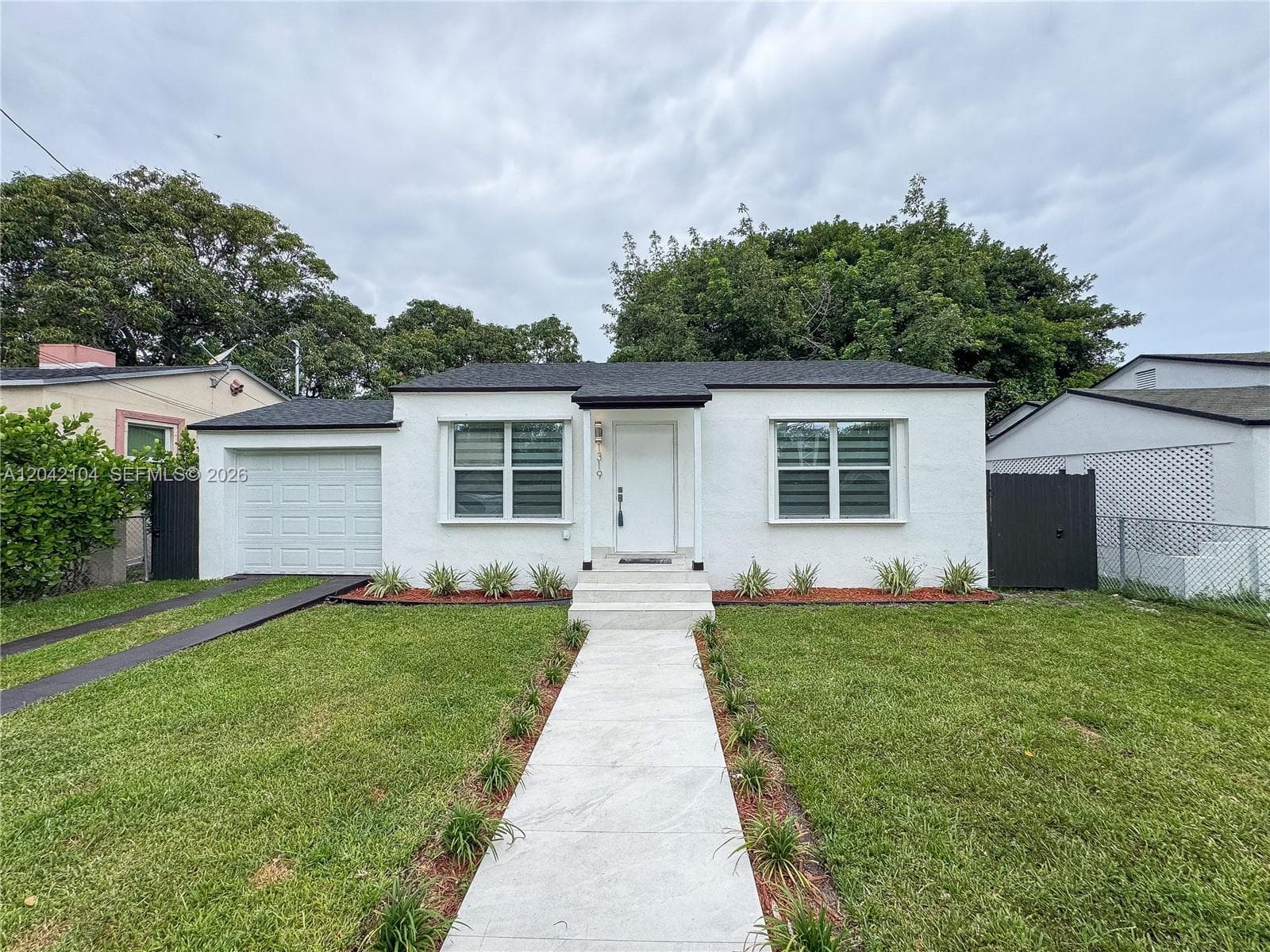 Single Family Residence at 1319 NW 40th St, Miami FL 33142