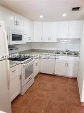 Condominium at 20 NW 87th Ave # A214, Miami FL 33172