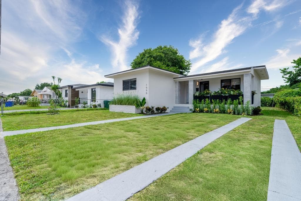 Single Family Residence at 1550 NW 52nd St, Miami FL 33142