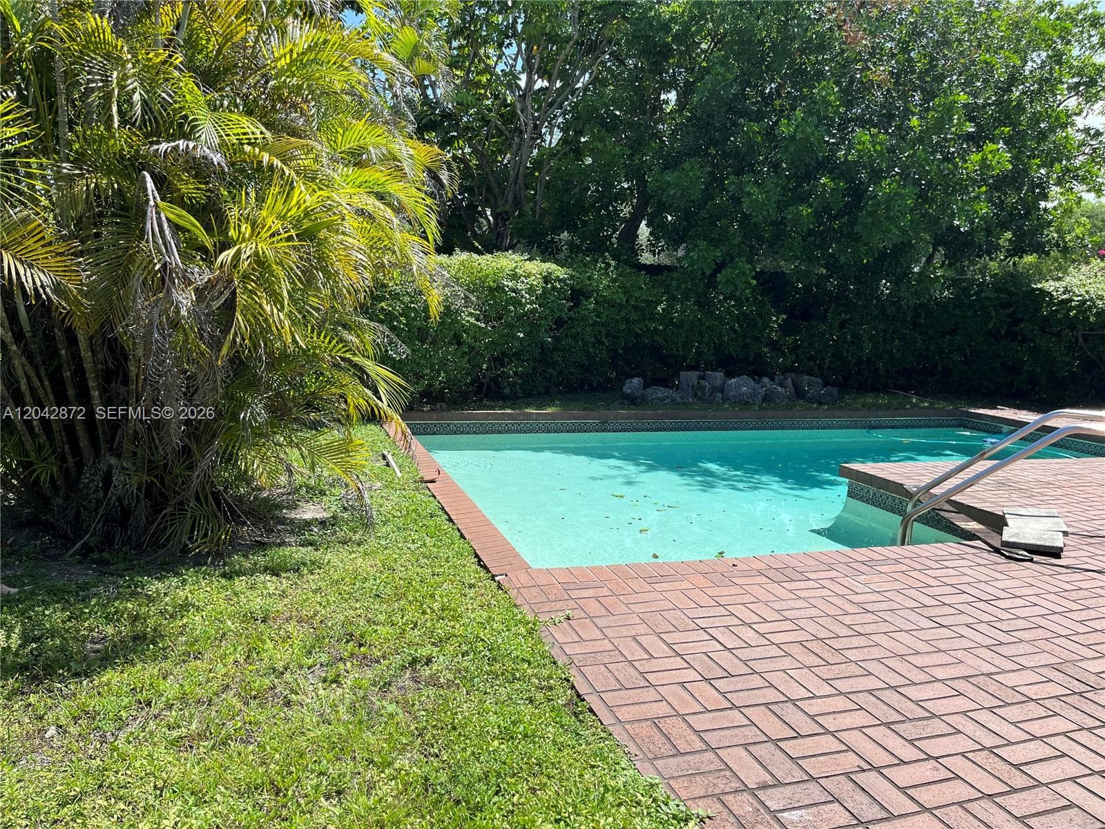 Single Family Residence at 1020 NE 202nd Ter, Miami FL 33179