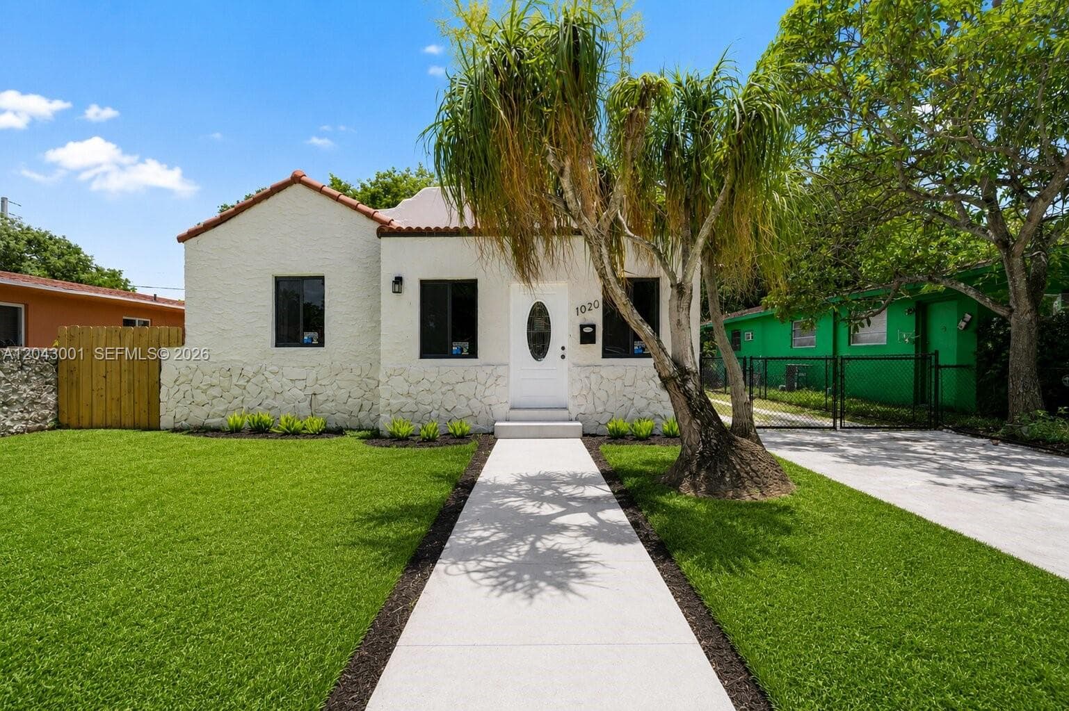 Single Family Residence at 1020 NW 49th St, Miami FL 33127