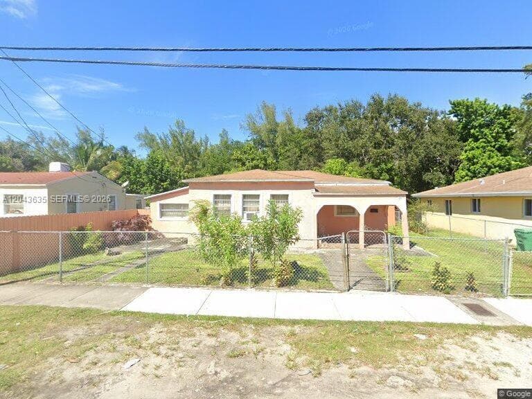 Single Family Residence at 111 NW 64th St, Miami FL 33150