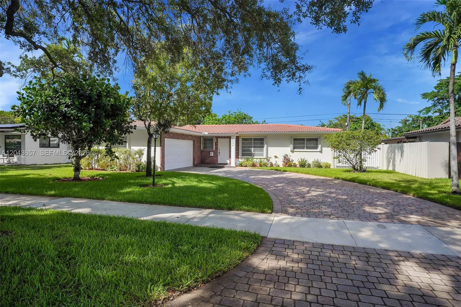 Single Family Residence at 14375 Lake Candlewood Ct, Miami Lakes FL 33014