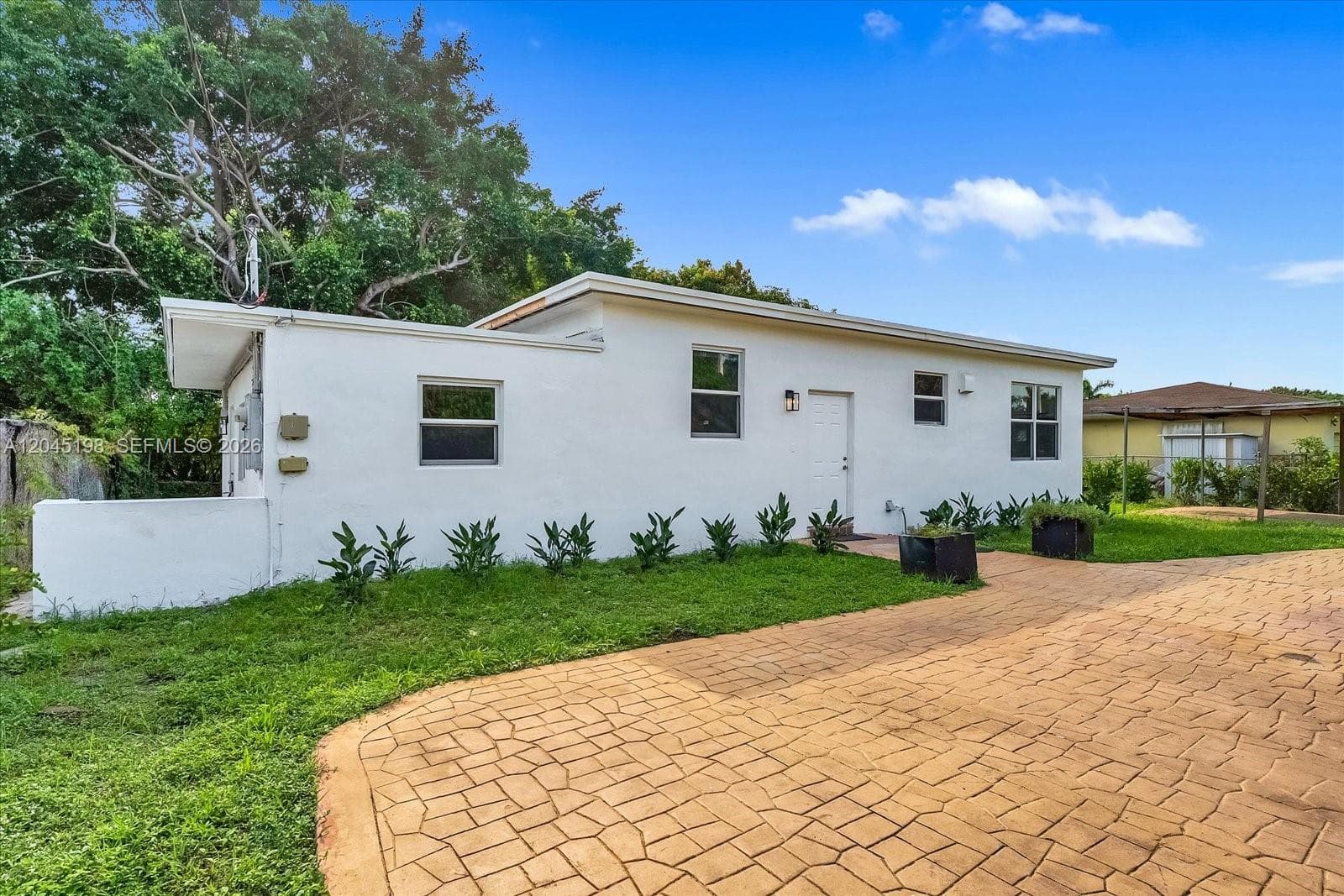 Single Family Residence at 13415 NW 22nd Ave, Miami FL 33167