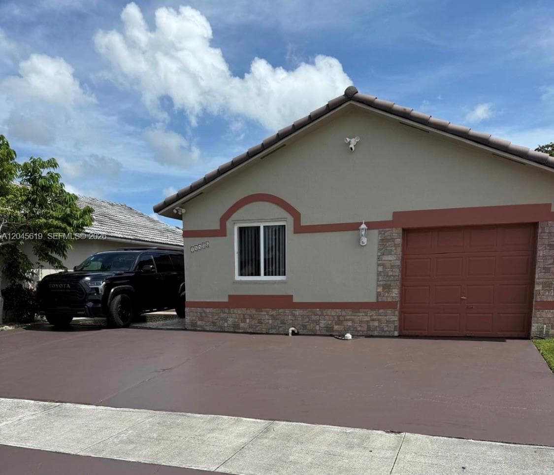 Single Family Residence at 14406 SW 179th Ln, Miami FL 33177