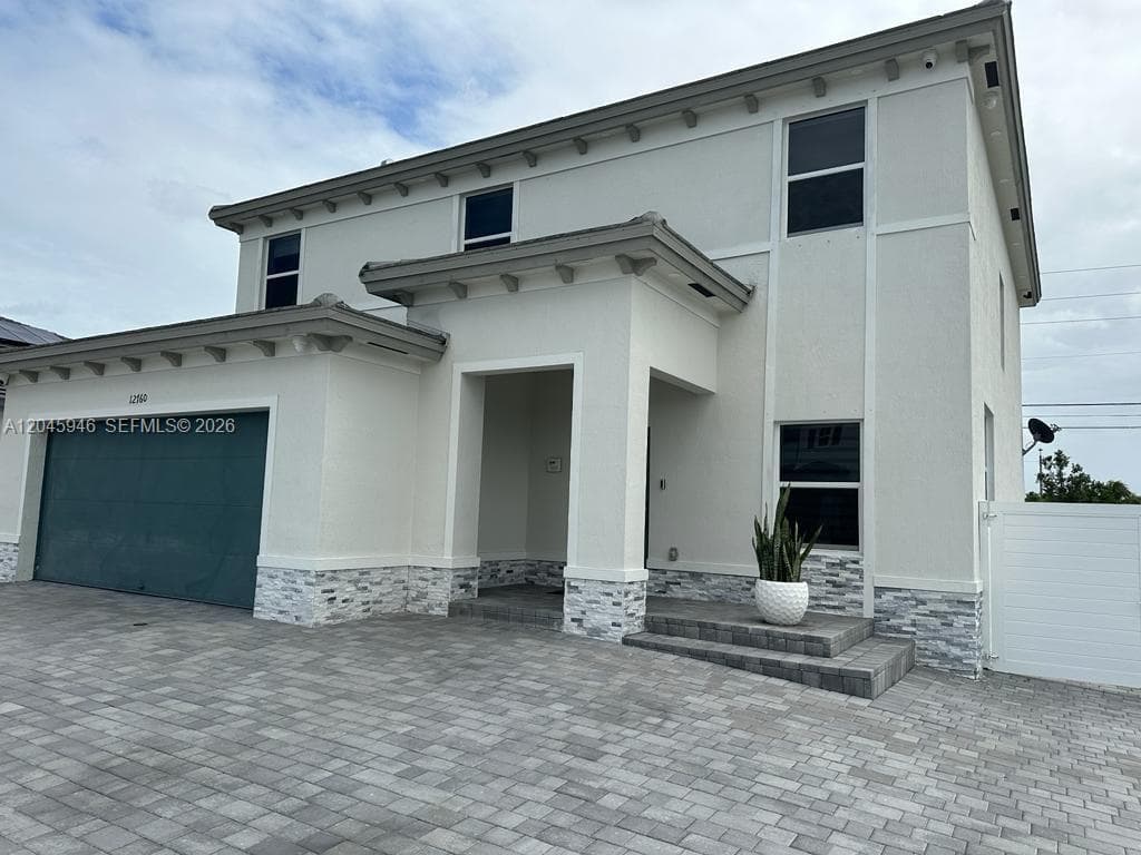 Single Family Residence at 12760 SW 215th Ter, Miami FL 33177