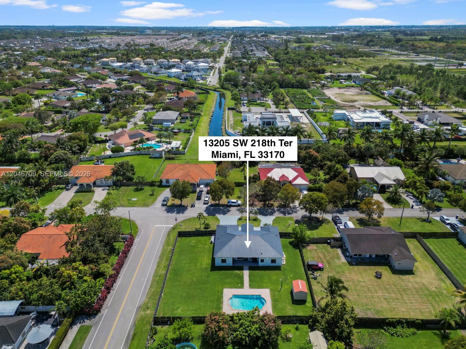 Single Family Residence at 13205 SW 218th Ter, Miami FL 33170