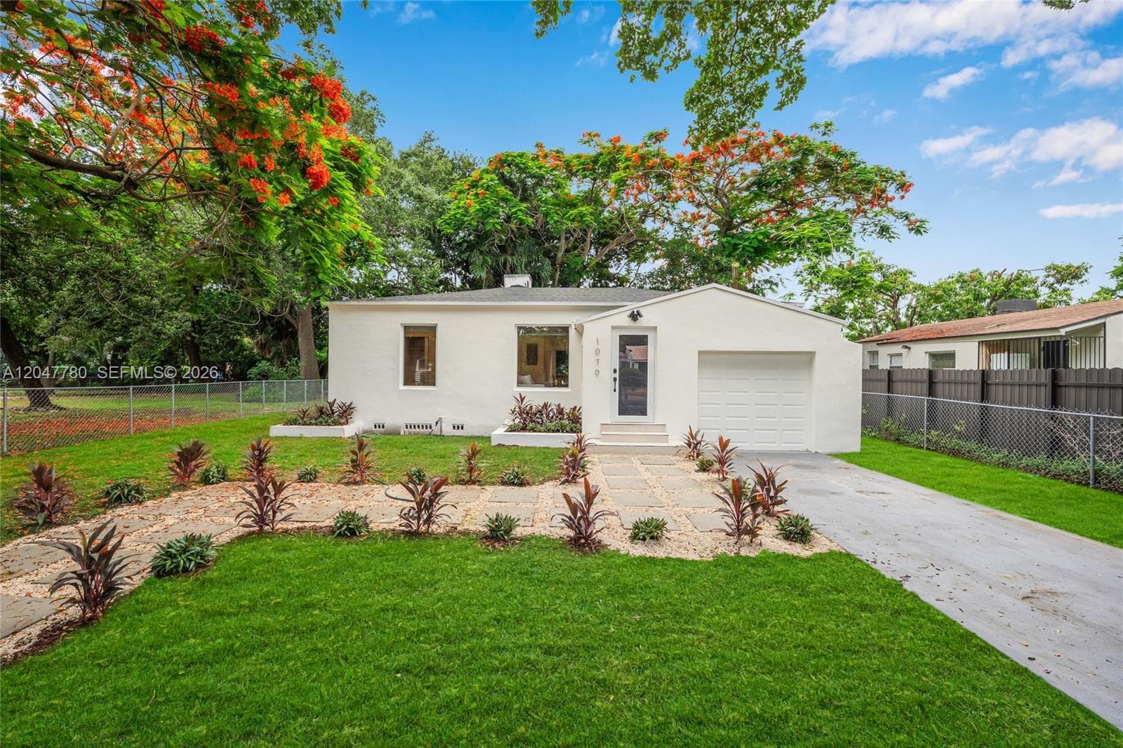 Single Family Residence at 1070 NW 44th St, Miami FL 33127