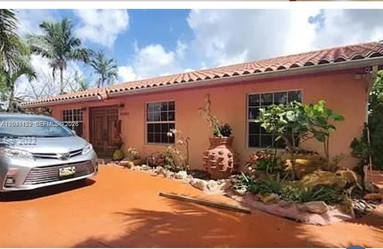 Single Family Residence at 10955 SW 56th St, Miami FL 33165