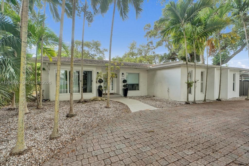 Single Family Residence at 2220 NE 204th St, Miami FL 33180