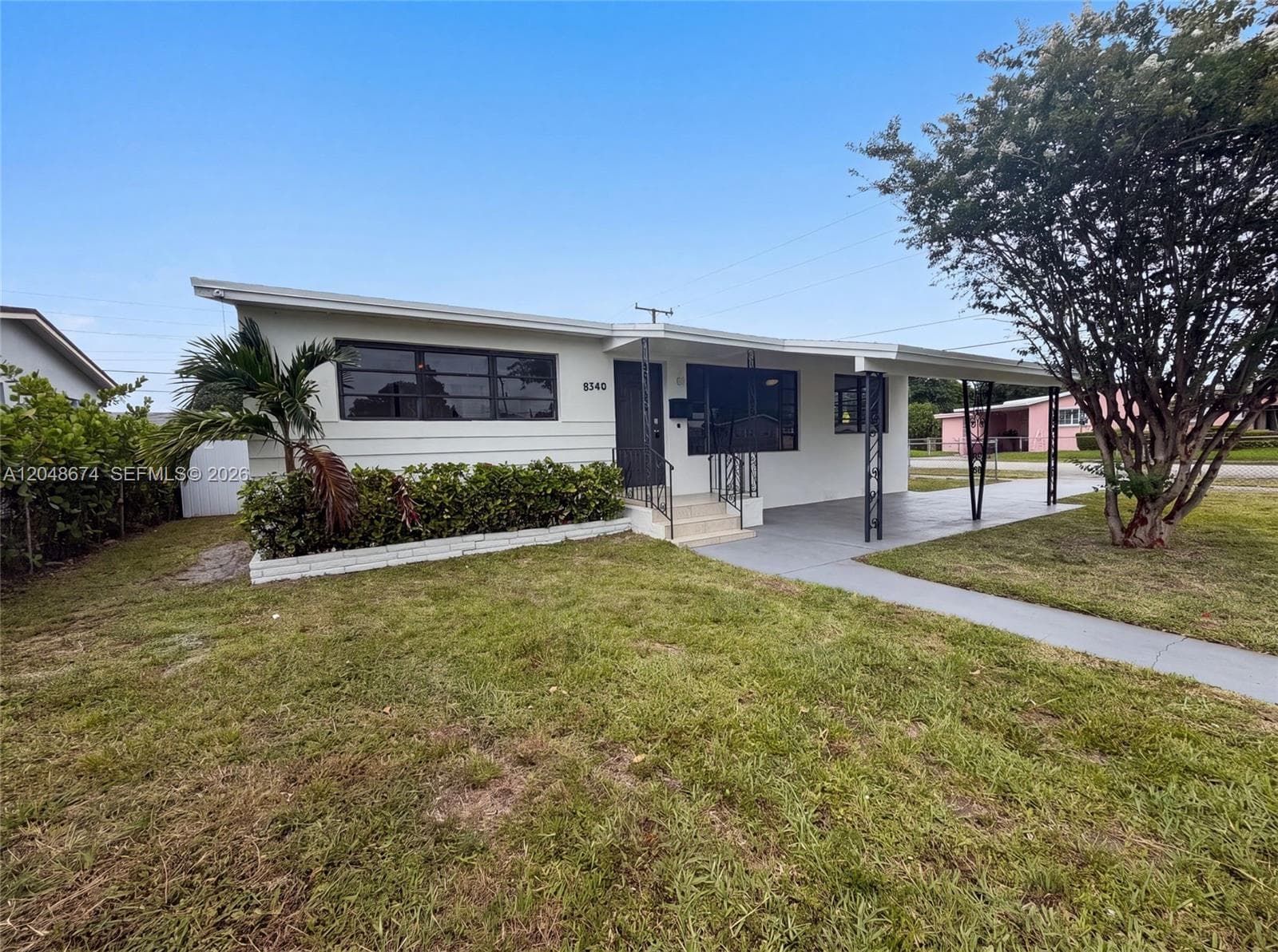 Single Family Residence at 8340 NW 22nd Pl, Miami FL 33147
