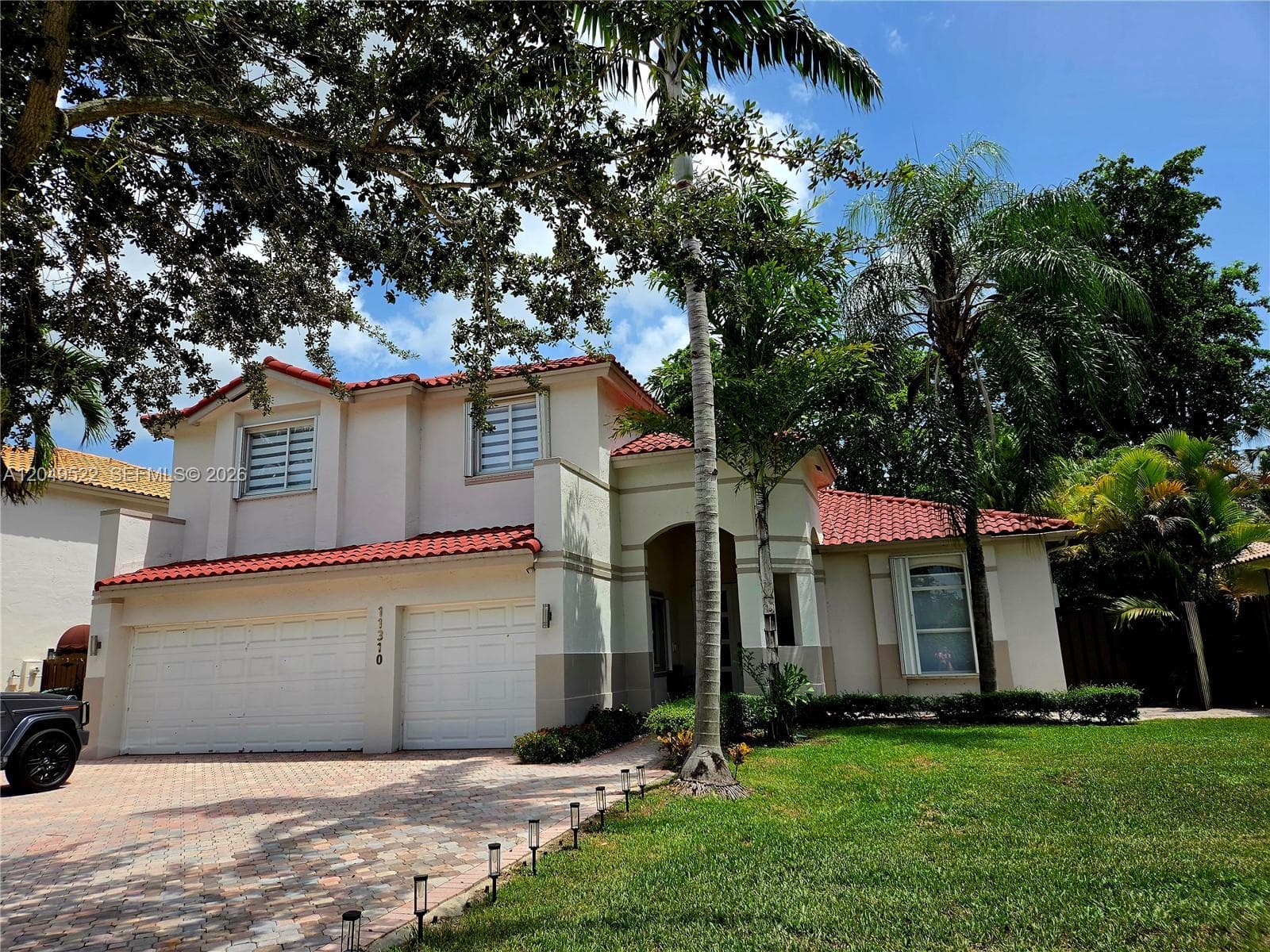 Single Family Residence at 11310 NW 61st St, Doral FL 33178