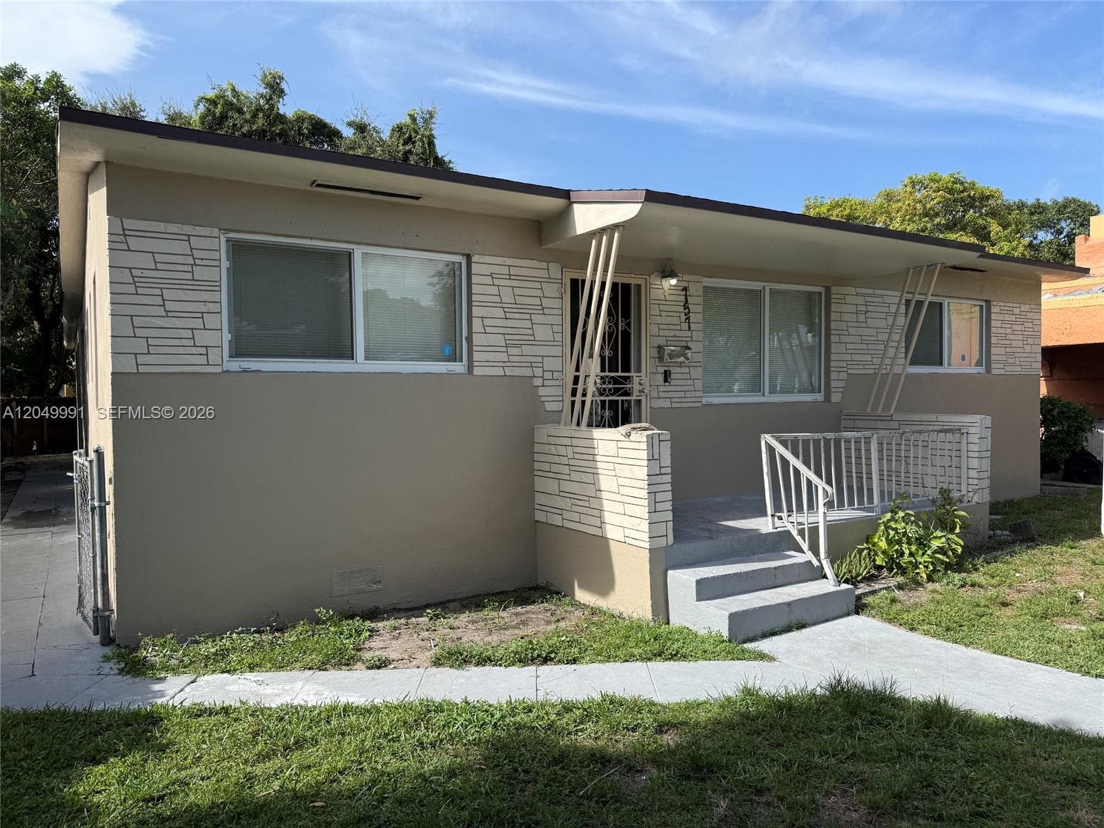 Single Family Residence at 757 NW 47th St, Miami FL 33127