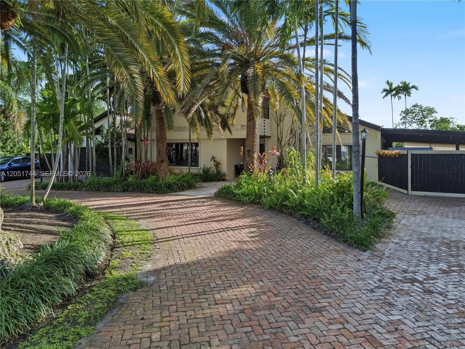 Single Family Residence at 9720 E Calusa Club Dr, Miami FL 33186