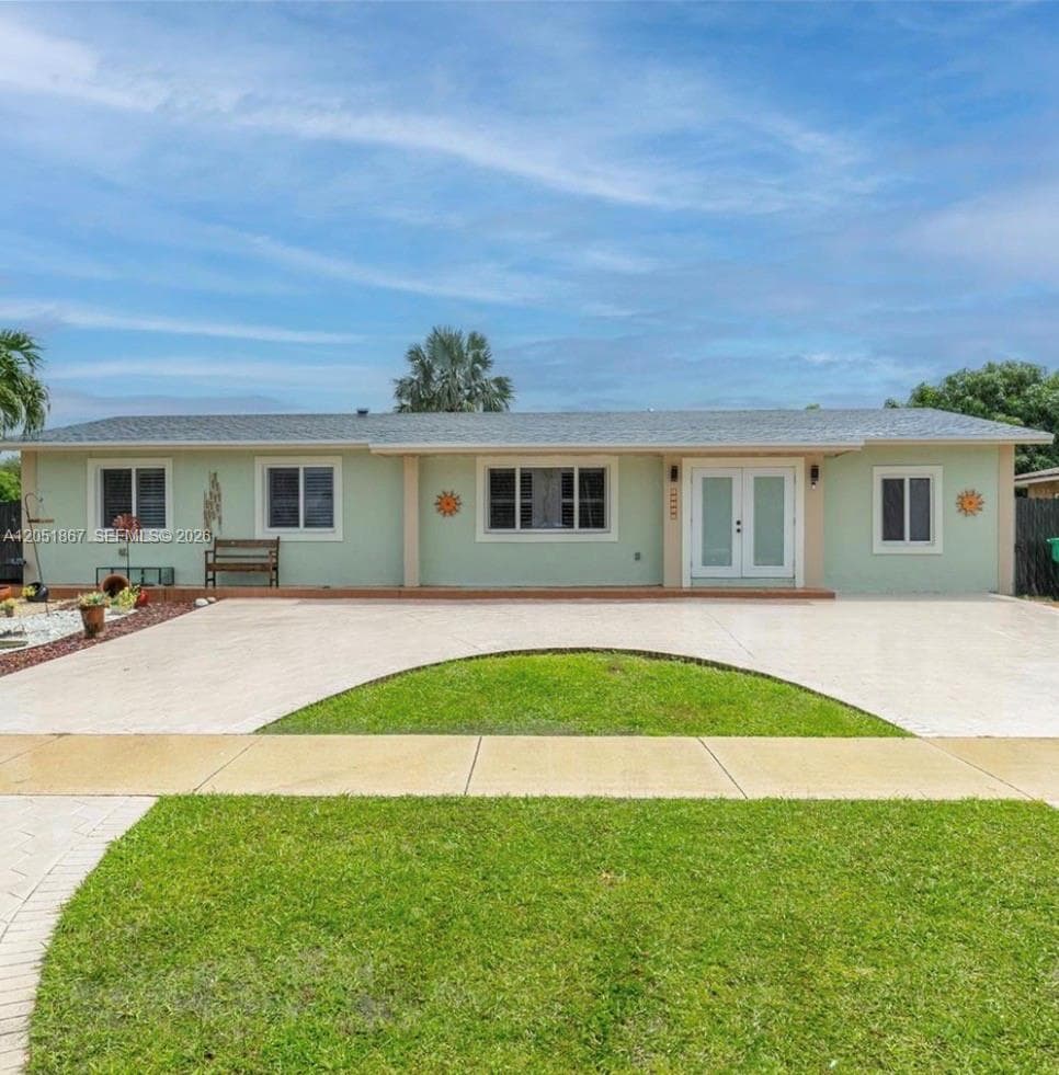 Single Family Residence at 10300 SW 155th St, Miami FL 33157