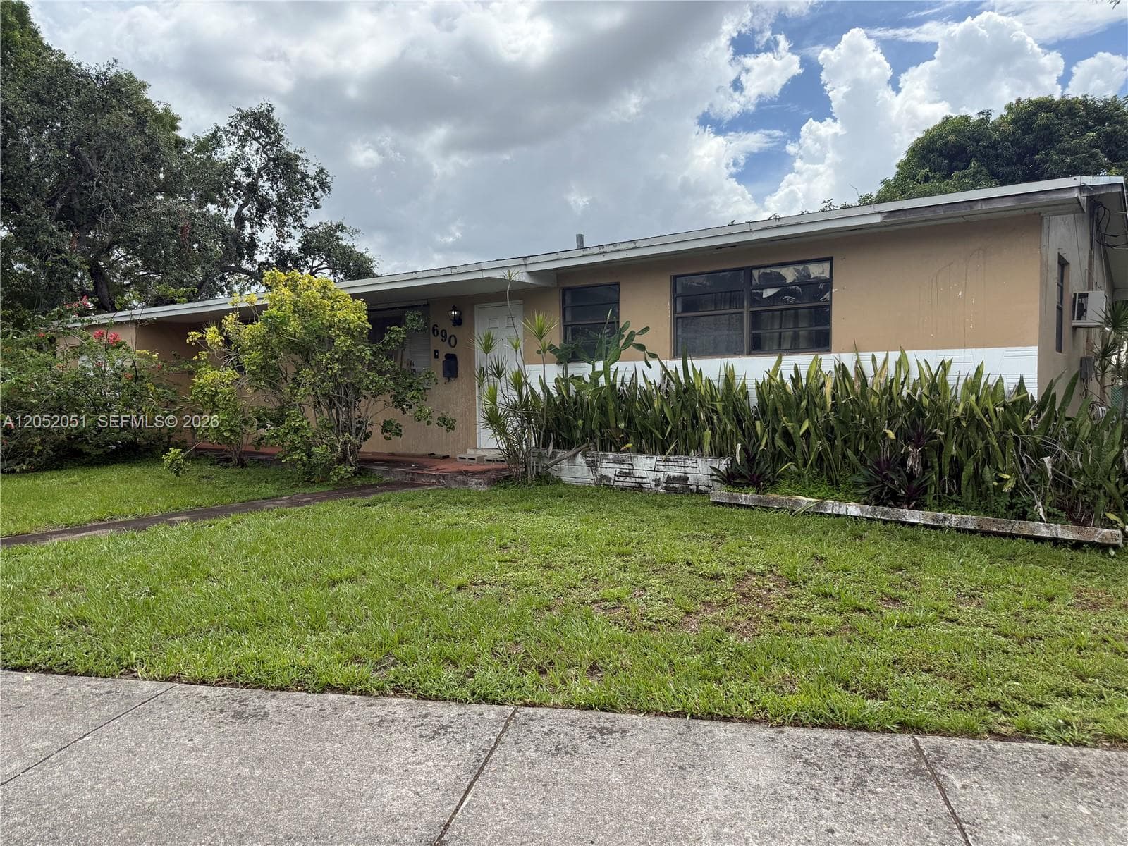 Single Family Residence at 690 W 70th Pl, Hialeah FL 33014