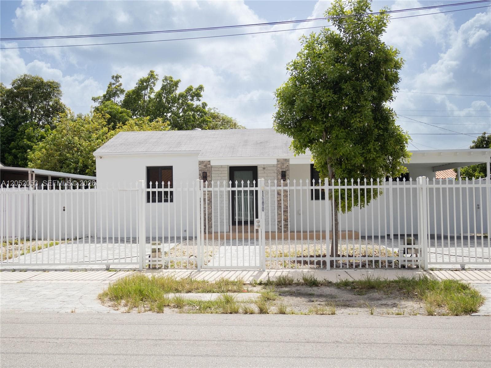 Single Family Residence at 1600 NW 29th Ave, Miami FL 33125