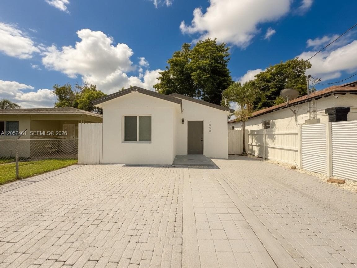 Single Family Residence at 1558 NW 71st St, Miami FL 33147