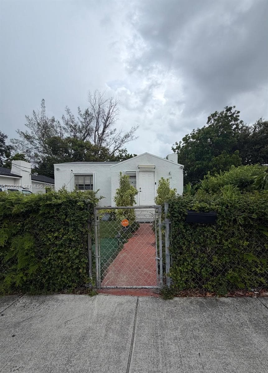 Single Family Residence at 1176 NW 58th Terrace, Miami FL 33127