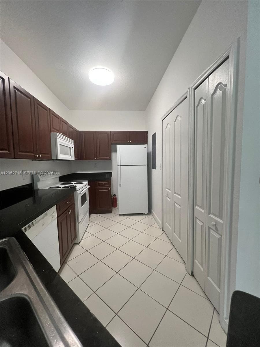 Condominium at 7200 NW 177th St # 7, Hialeah FL 33015