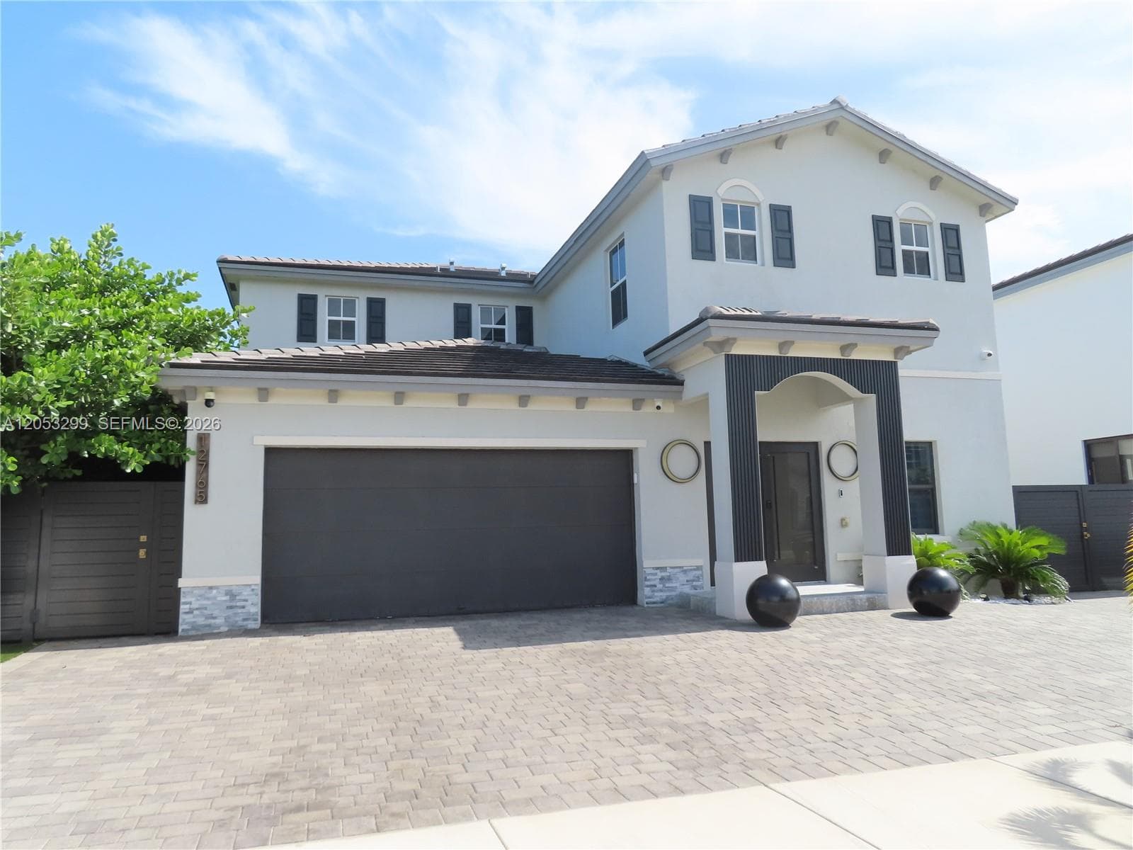 Single Family Residence at 12765 SW 210th Ter, Miami FL 33177