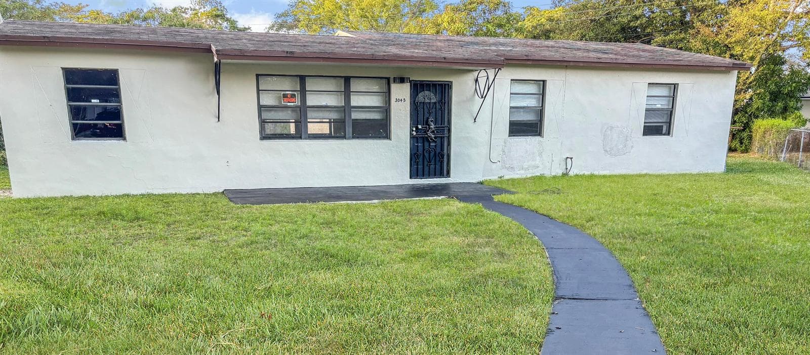 Single Family Residence at 3045 NW 68th Street NW, Miami FL 33147