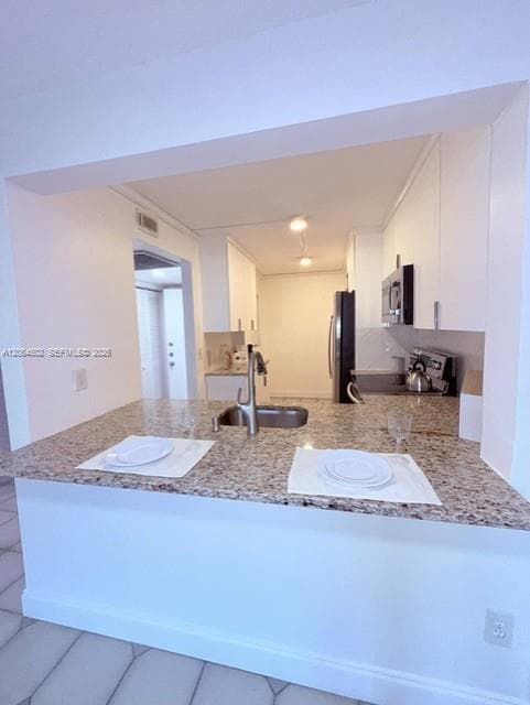 Apartment at 871 NE 207th Ter # 102, Miami FL 33179