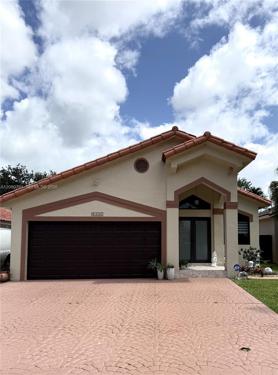 Single Family Residence at 8731 NW 153rd Ter, Miami Lakes FL 33018