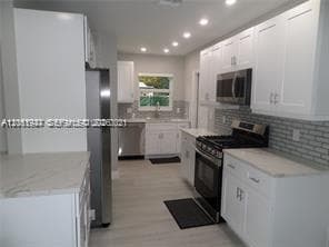 Single Family Residence at 6540 W 11th Ave, Hialeah FL 33012