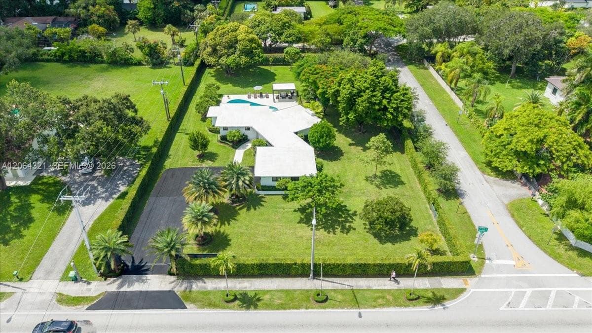 Single Family Residence at 7240 Sunset Dr, Miami FL 33143